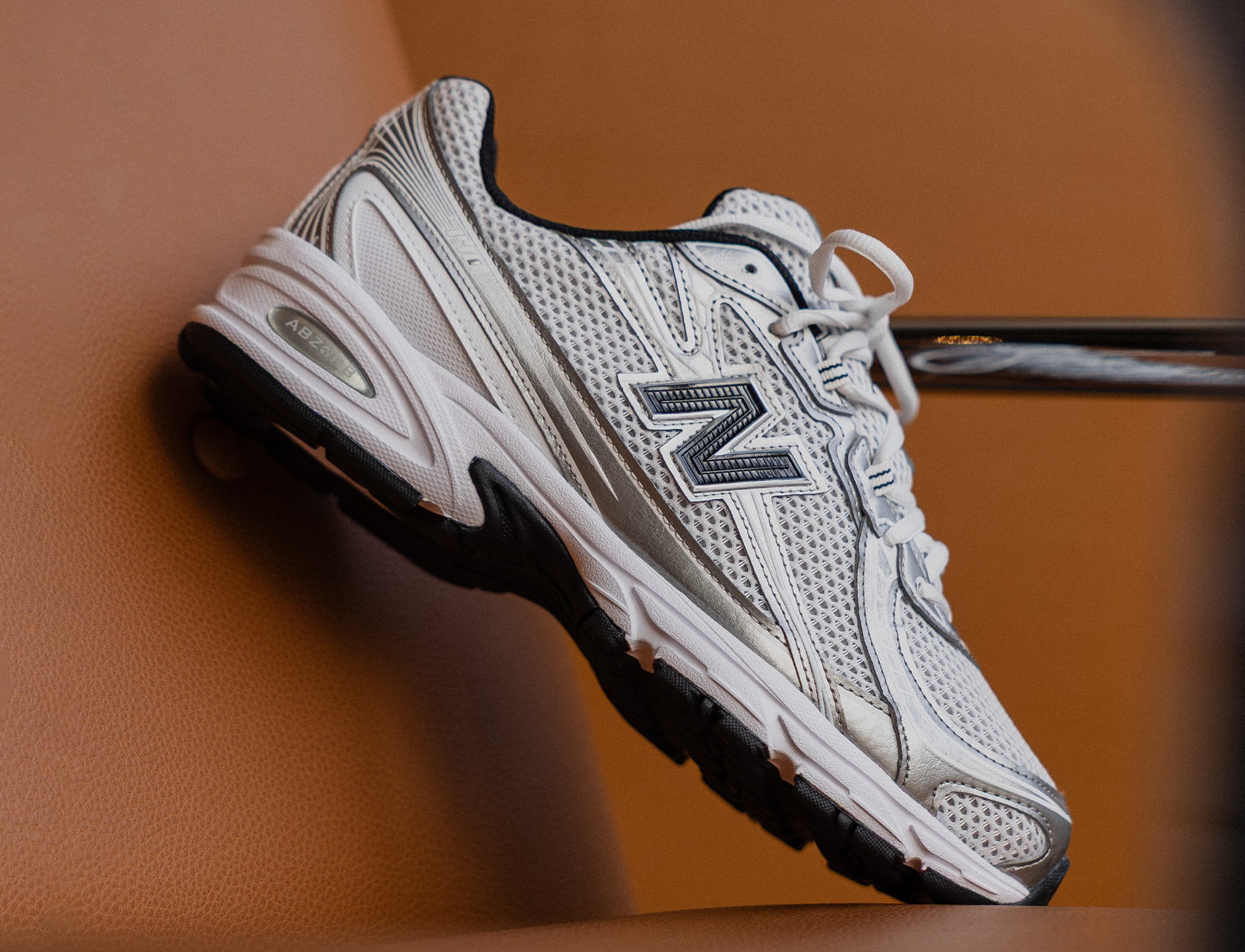 New Balance 740 white silver metallic black