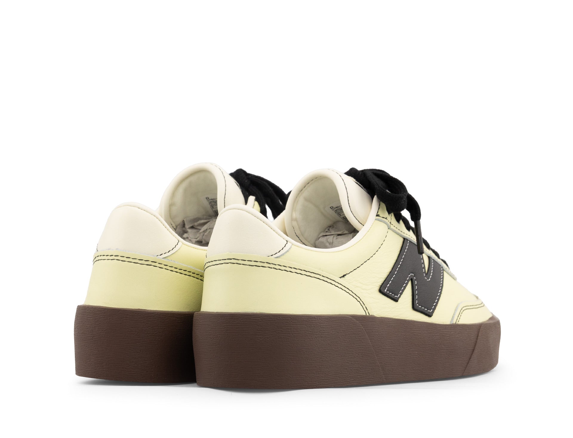New Balance 750 dawn glow black