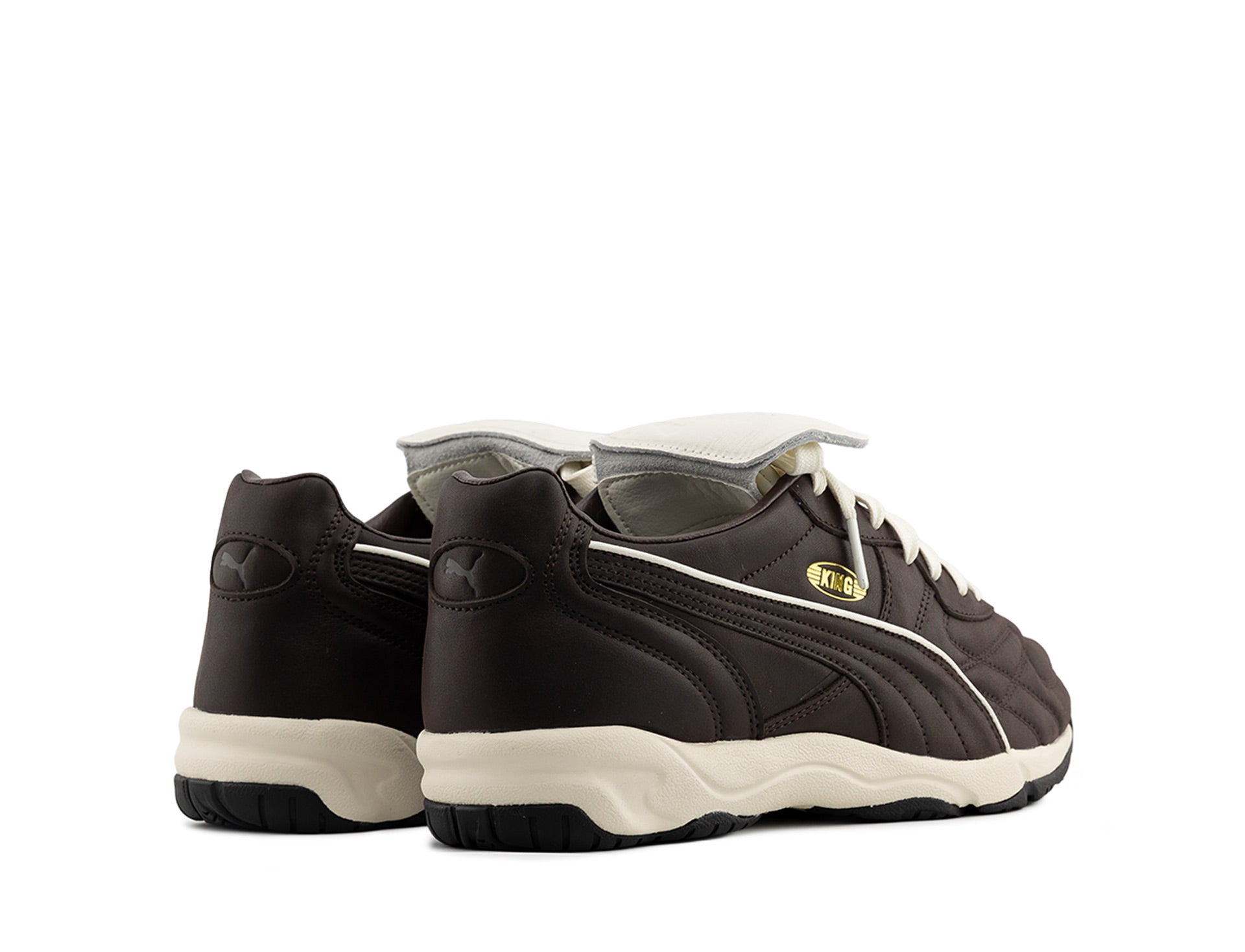 Puma King Indoor Premium dark chocolate warm white