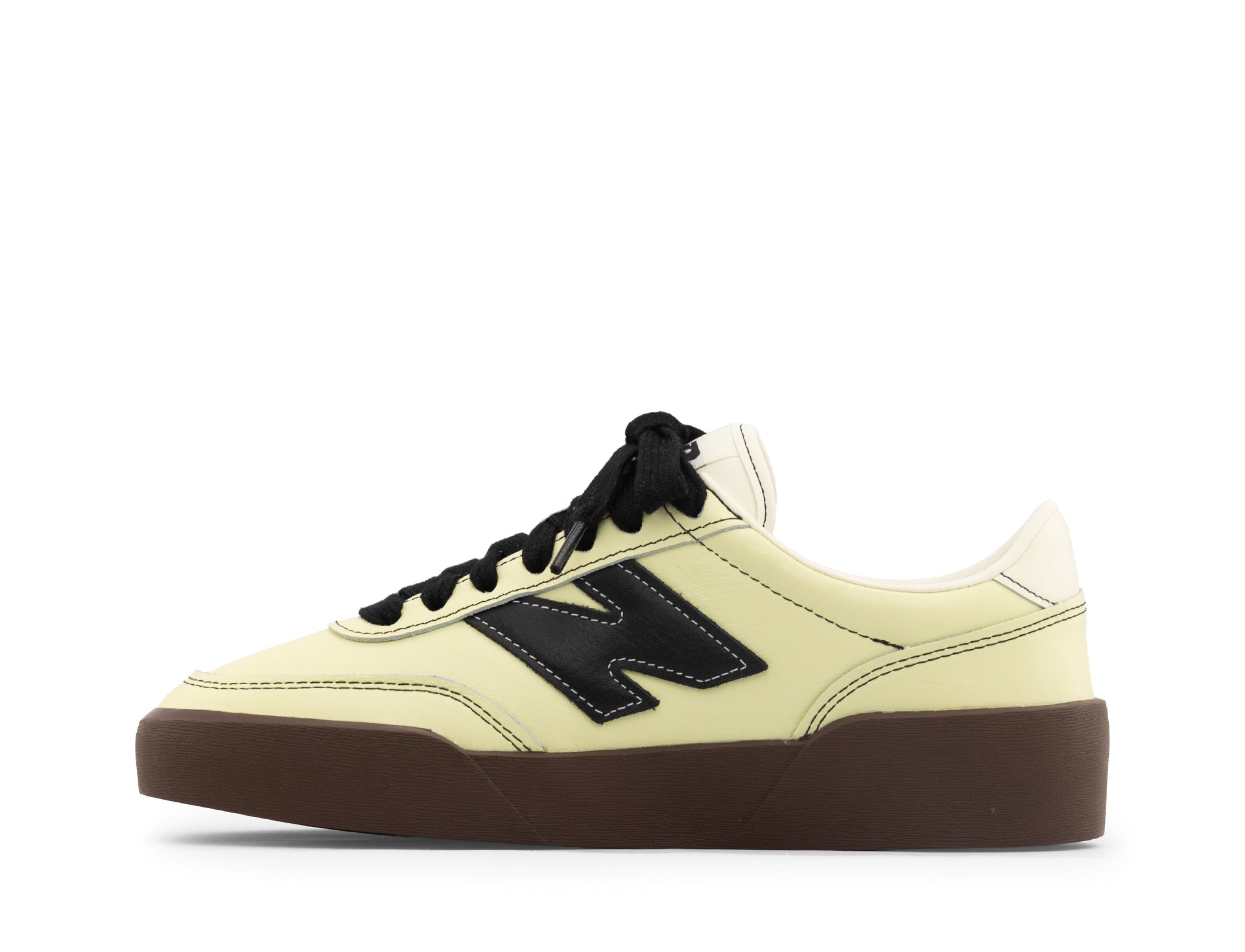 New Balance 750 dawn glow black