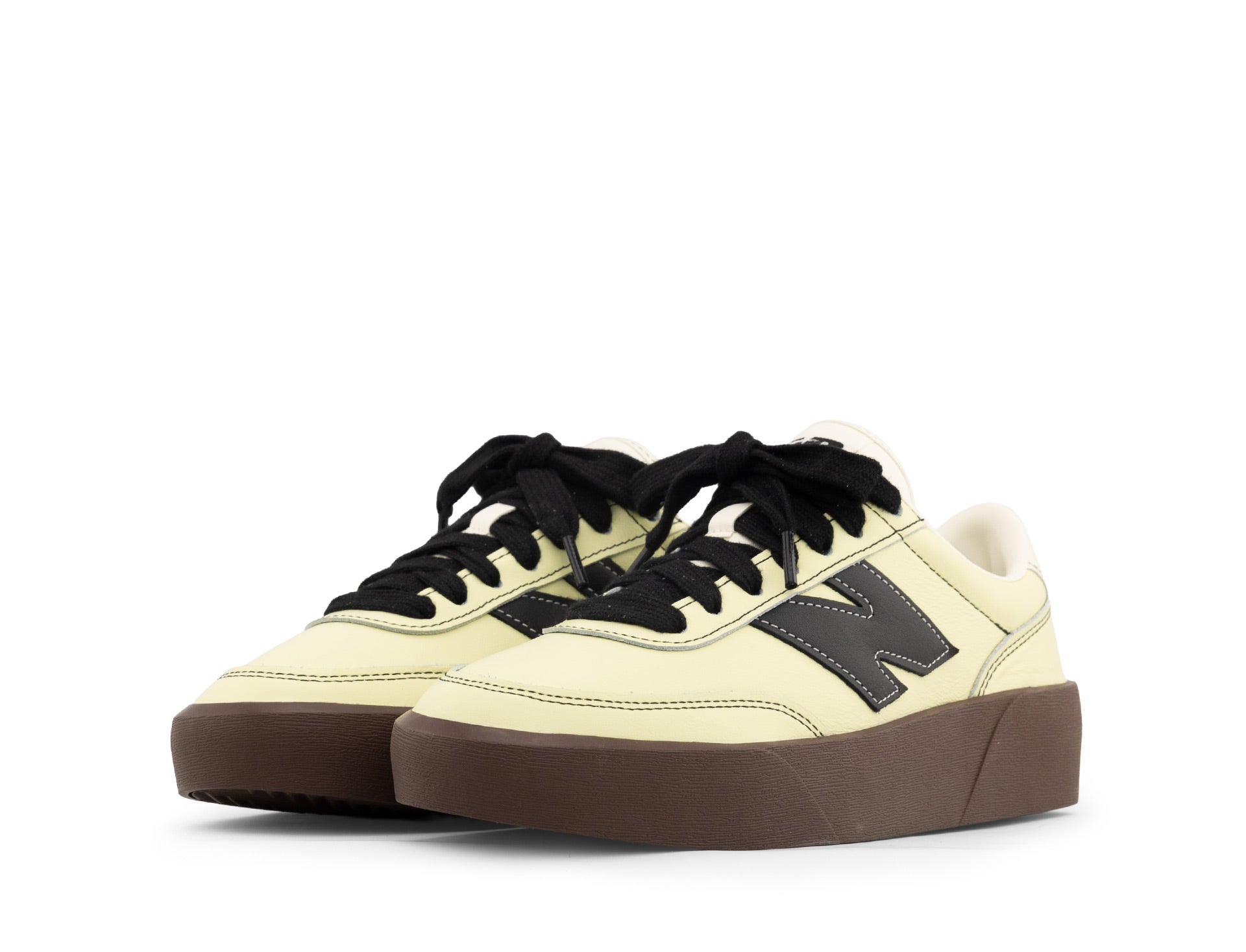 New Balance 750 dawn glow black