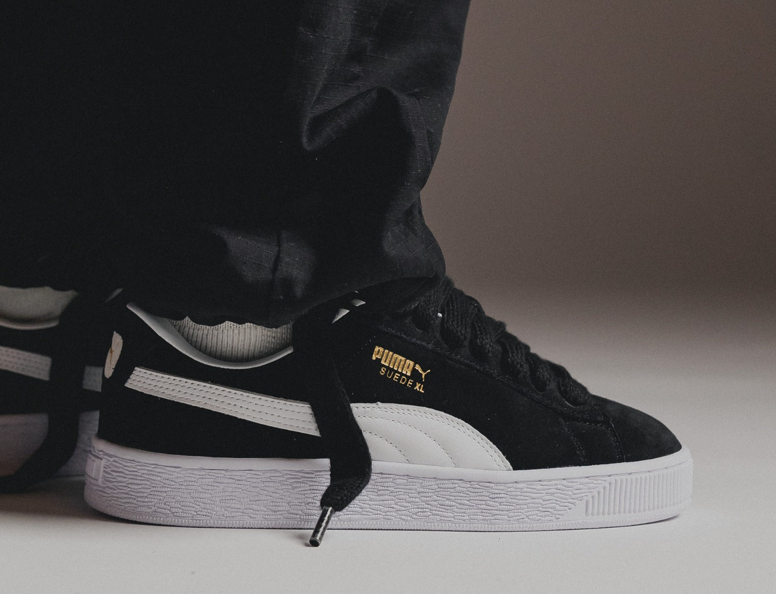 Puma Suede XL black white on foot 1